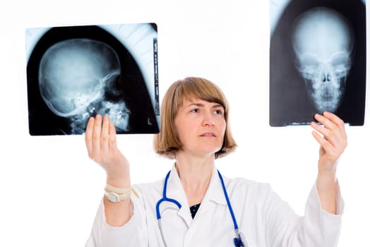 young female doctor with X-ray photograph in front of white background