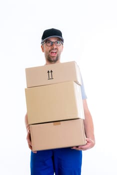 overstrained postman with parcels in front of white background