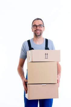 friendly postman with parcels in front of white background
