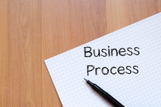 Business process text concept write on notebook