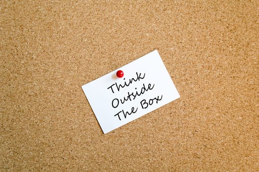 Sticky Note On Cork Board Background And Text Concept