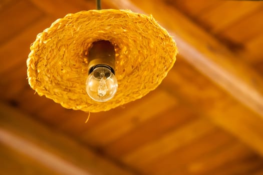 Ancient handmade chandelier in an italian tavern