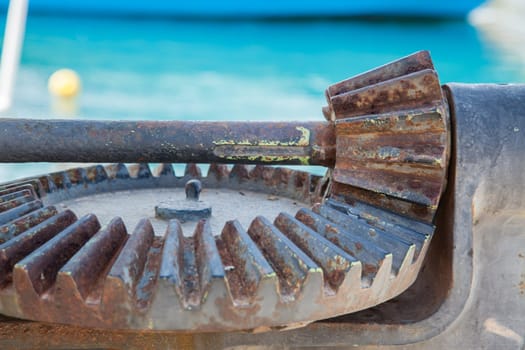 Old rusty weathered sea boats gears on a port