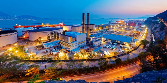 petrochemical industry on sunset , hong kong coal power station and oil tank