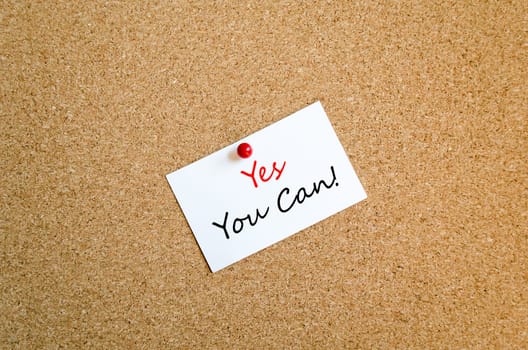 Sticky Note On Cork Board Background And Text Concept