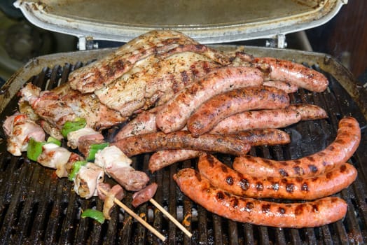different grilled meat on the barbecue
