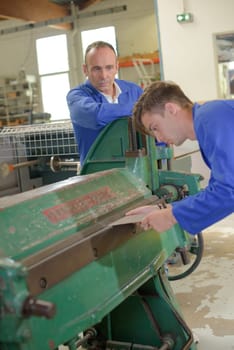 Training using machine, supervisor watching