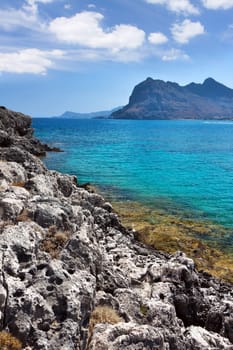 Kolymbia beach with the rocky coast in Greece.