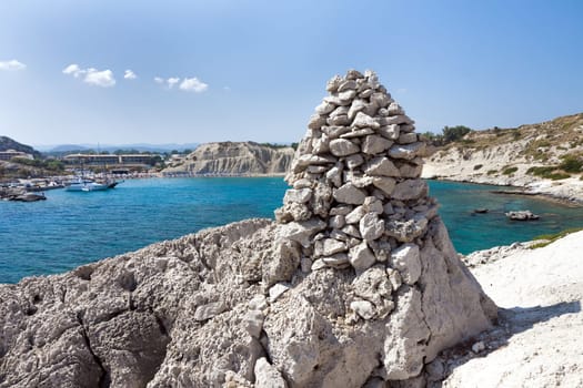 Kolymbia beach with the rocky coast in Greece.