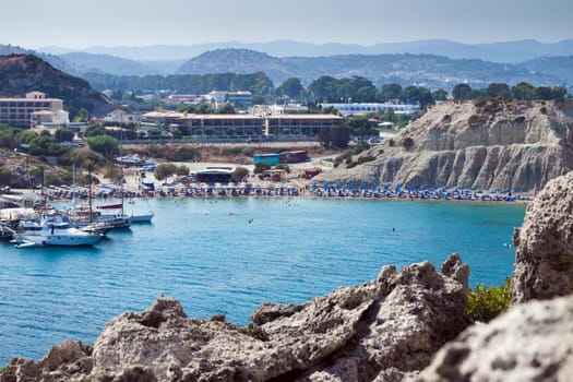 Kolymbia beach with the rocky coast in Greece.