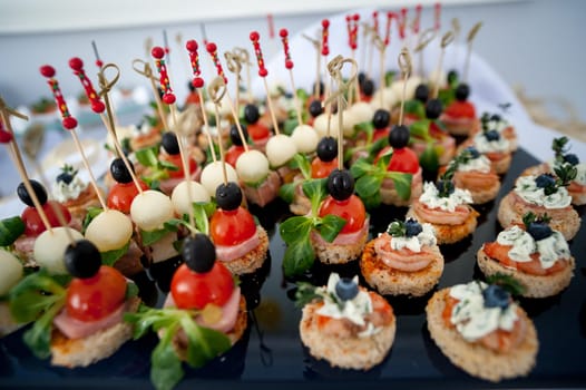 beautiful candy bar serving a festive table with cupcakes towers and sweet love sign