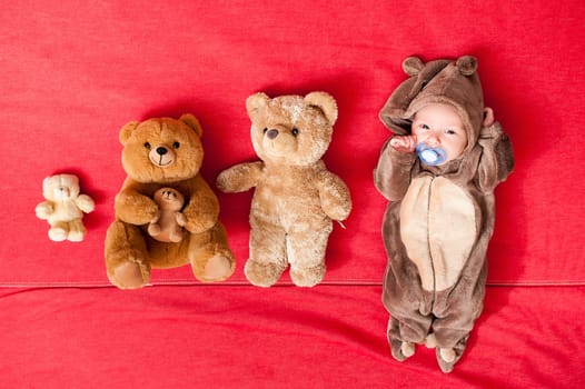 Baby sleeping with her teddy bear, new family and love concept Soft focus and blurry