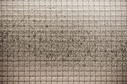 Old light brown glass vintage background, textured
