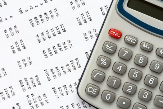 Close-up of calculator on financial statement , concept of accounts