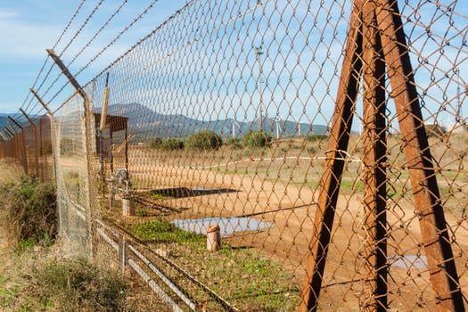 Rusted wire netting in industrial place