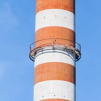 red and white chimney close up