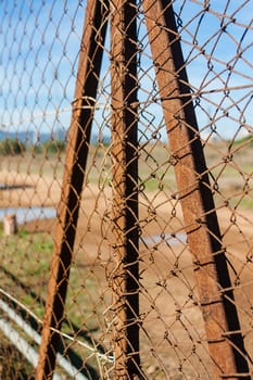 Rusted wire netting in industrial place