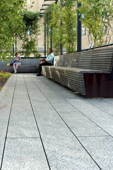 NEW YORK CITY - SEPTEMBER 03: People at High Line Park in NYC on September 03th, 2013. The High Line is a public park built on an historic freight rail line elevated above the streets on Manhattan West Side.