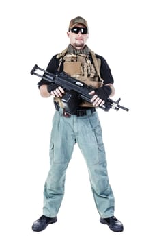 Studio shot of private military contractor PMC with assault rifle