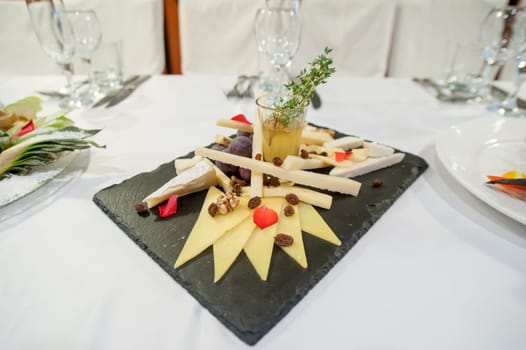 beautiful candy bar serving a festive table with cupcakes towers and sweet love sign