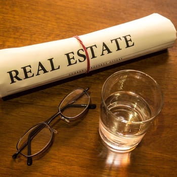 real estate newspaper on desk