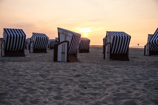 beach chairs in evening sunlight