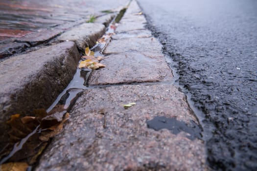 drip rail near sidewalk