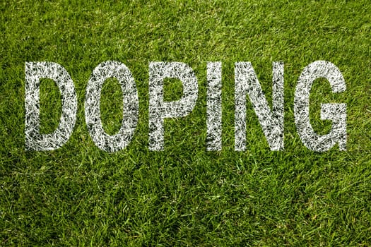 doping text on green grass