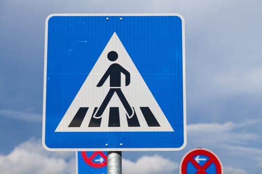 zebra crossing sign and sky