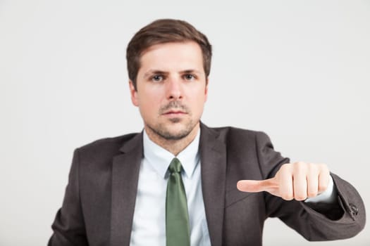 hands of businessman with thump in middle