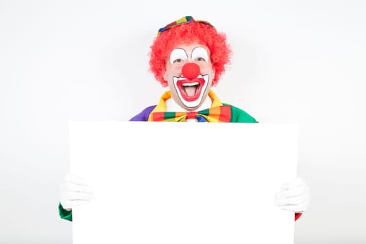 clown with blank board on white background