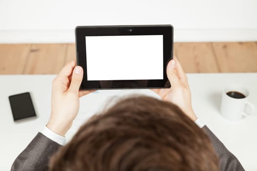 businessman holding a tablet (whitespace)