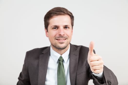 business man hand thumb up