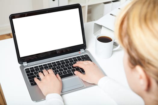 woman working on laptop in office