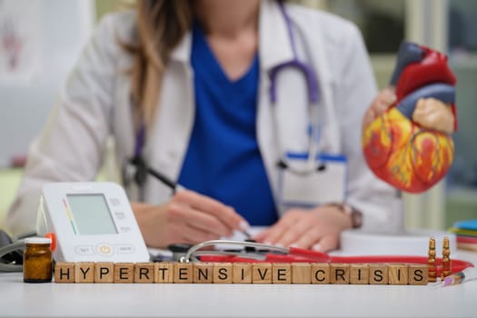 A healthcare provider effectively managing a hypertensive crisis using precise monitoring tools and techniques
