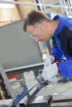 polishing a metal frame