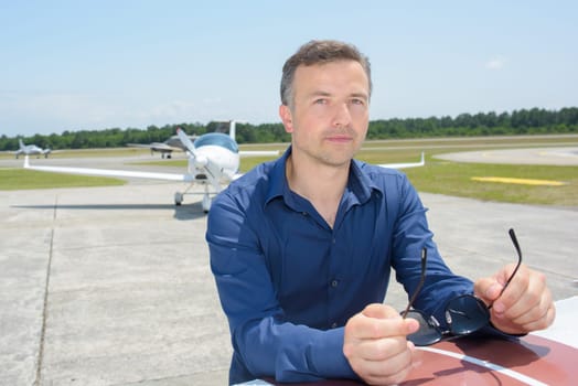 Portrait of man at airport