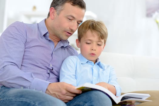 Adult and child reading