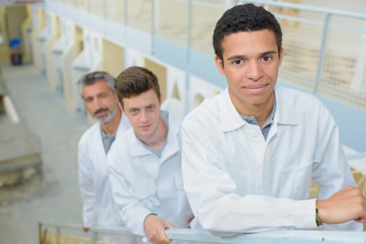 three men in the stairs
