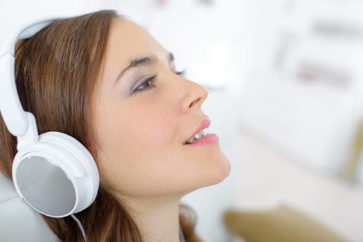 Woman relaxing to some music