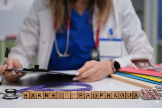 A medical doctor is discussing Barrett Esophagus with a patient in a professional clinical environment setting