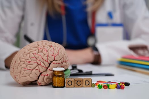 We are exploring the complexities of OCD through a brain model, medication, and therapeutic tools in a clinical setting