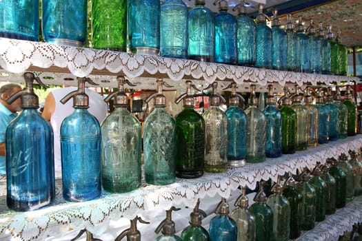 Old siphon bottles for soda, flea market of Buenos Aires