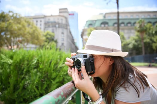Tourist taking picture in Plaza de Mayo, Buenos Aires