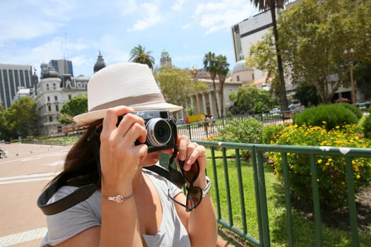 Tourist taking picture in Plaza de Mayo, Buenos Aires