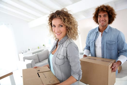 Couple moving in new apartment