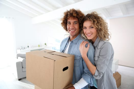 Couple moving in new apartment