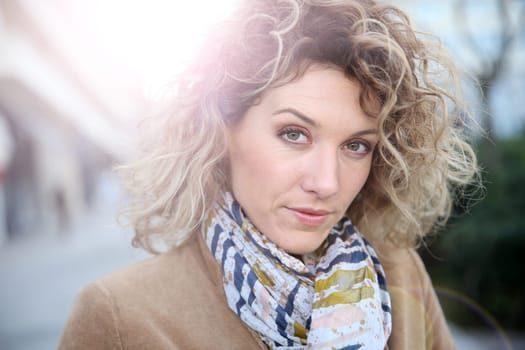 Beautiful attractive woman in city