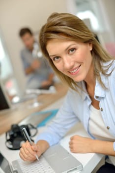 Smart middle-aged businesswoman at work