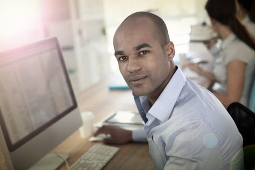 Portrait of young businessman in office